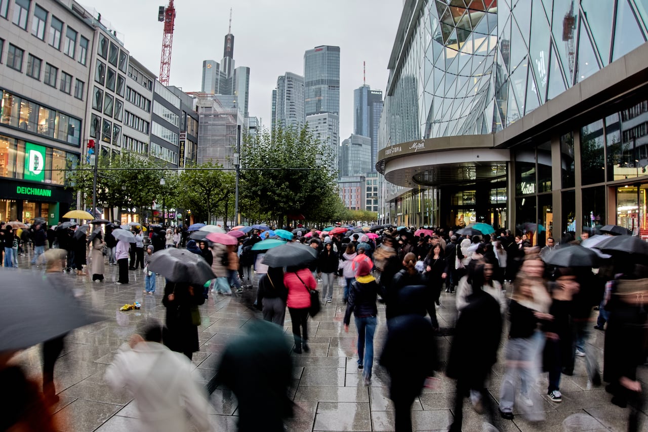 People walk on the main shopping street in Frankfurt, Germany, on Oct. 25, 2025.