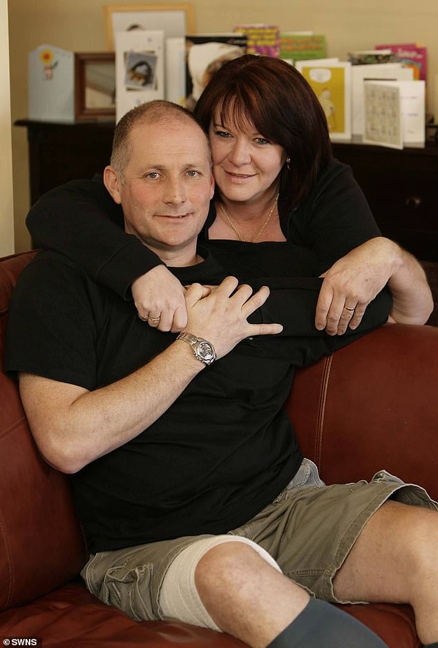 Police dog handler Neil Sampson recovering at home in Wiltshire in 2008 with his wife Mandy