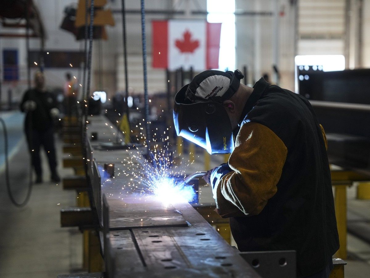 A welder works at Walters Group Steel fabrication plant in Hamilton, Ont., Wednesday, July 16, 2025.