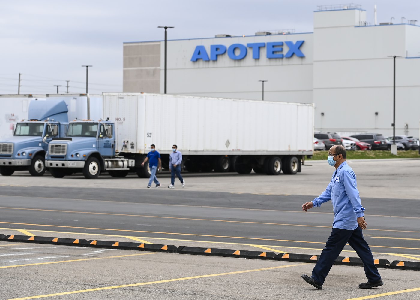 Apotex workers are shown in Toronto on Friday, April 9, 2023. THE CANADIAN PRESS/Nathan Denette