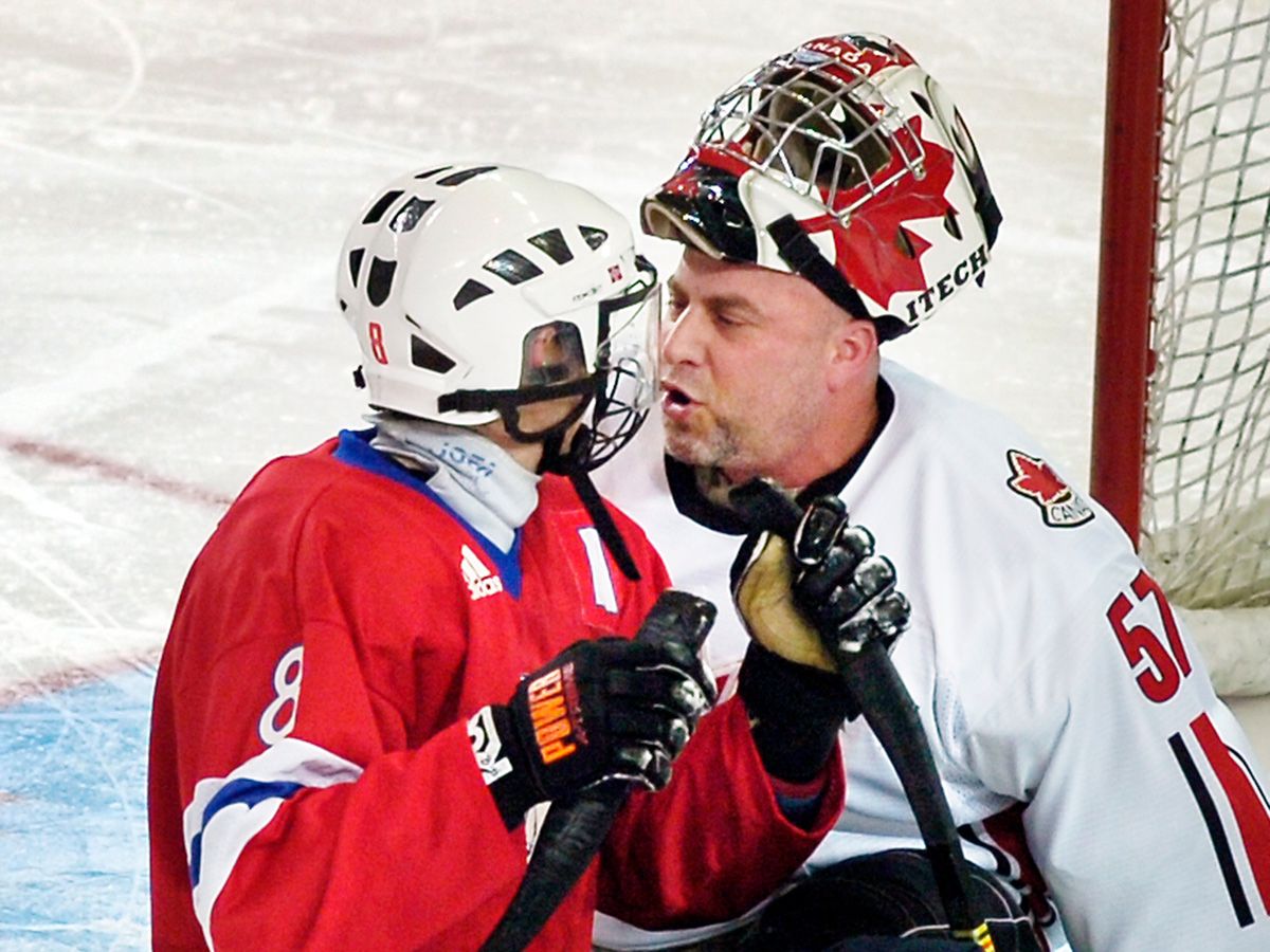 Canadian goalie Paul Rosen stares down an opponent in his crease during a game at the 2006 Torino Winter Paralympic Games. Rosen says he sometimes faced antisemitism from his opponents during games.