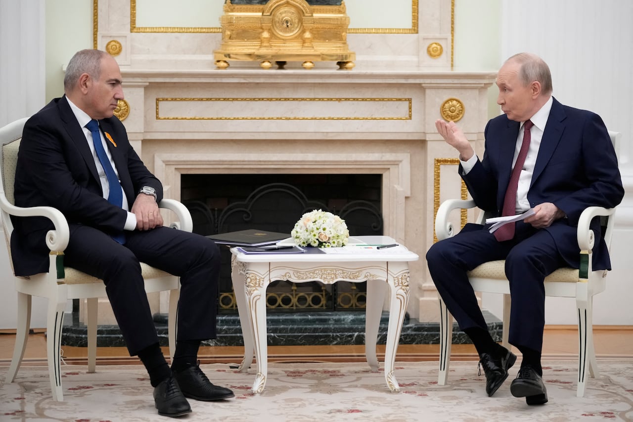 Russian President Vladimir Putin talks to Armenian Prime Minister Nikol Pashinyan during a meeting at the Kremlin in Moscow, Russia, in April 2026. Pashinyan is currently attempting to get re-elected in Armenia, on a platform focused on pivoting toward the West and moving away from Russian influence. (Pavel Bednyakov/Reuters)