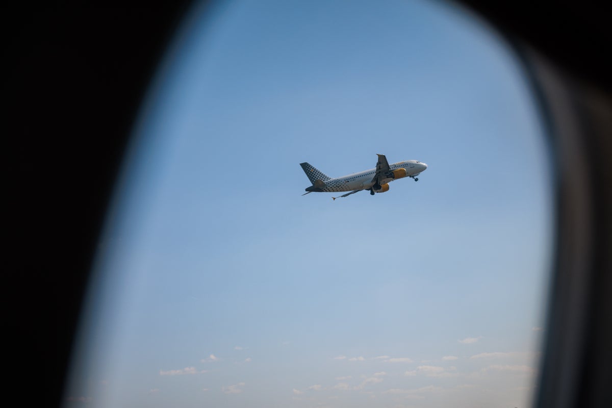 TALY-FLORENCE-AIRPLANE-WINDOW-TAKEOFF