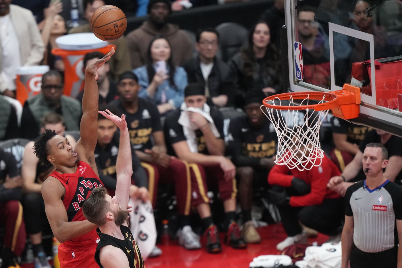 Toronto Raptors' Scottie Barnes (4) take shot over Cleveland Cavaliers' Cleveland Cavaliers' Dean Wade (32) during first half NBA playoff basketball action in Toronto on Friday, May 1, 2026. THE CANADIAN PRESS/Nathan Denette