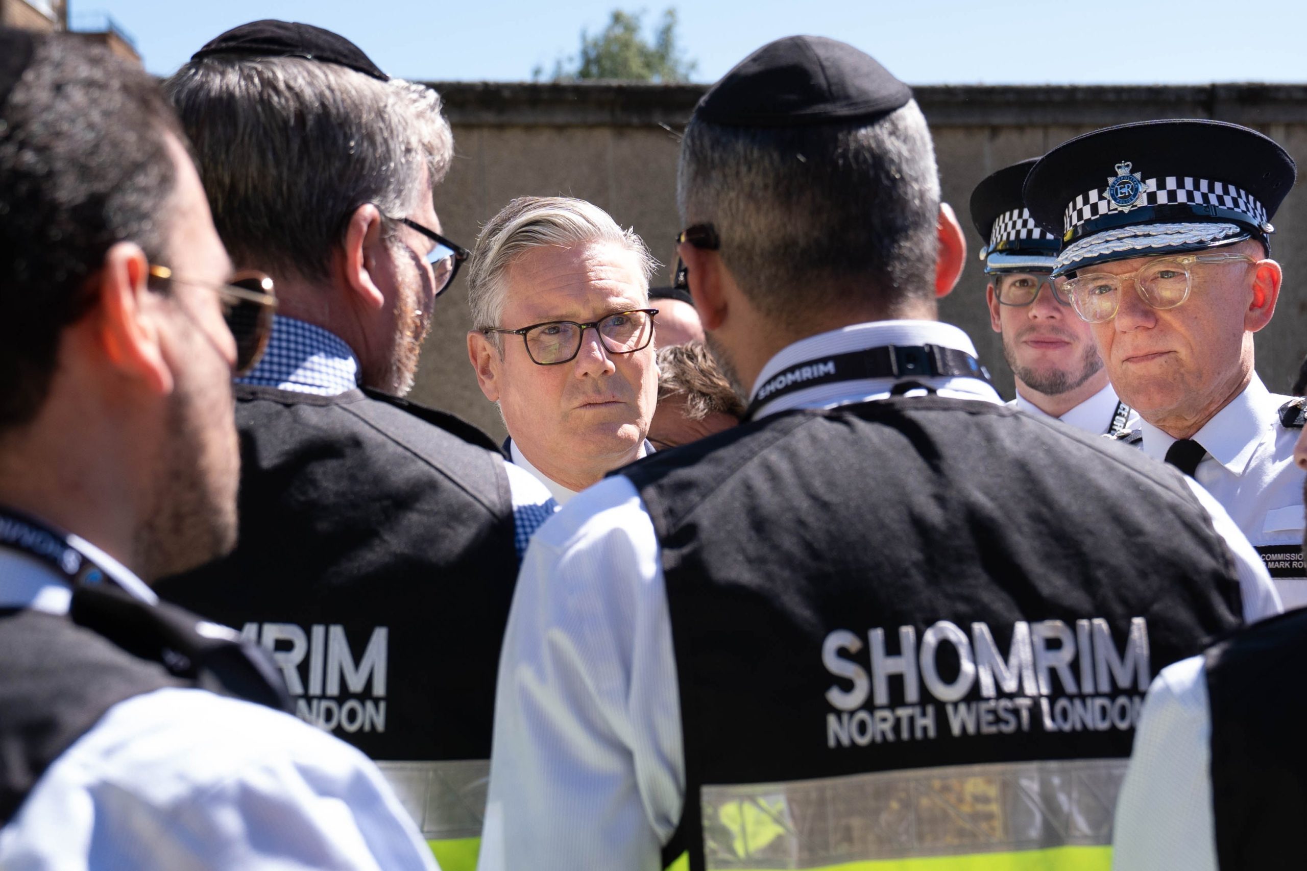 The PM meeting first responders from Shomrim North West London during a visit to Golders Green (PA Wire)