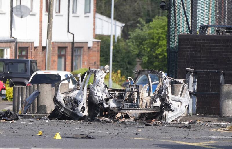 The scene in Dunmurry in Northern Ireland after reports of a car explosion outside a police station.