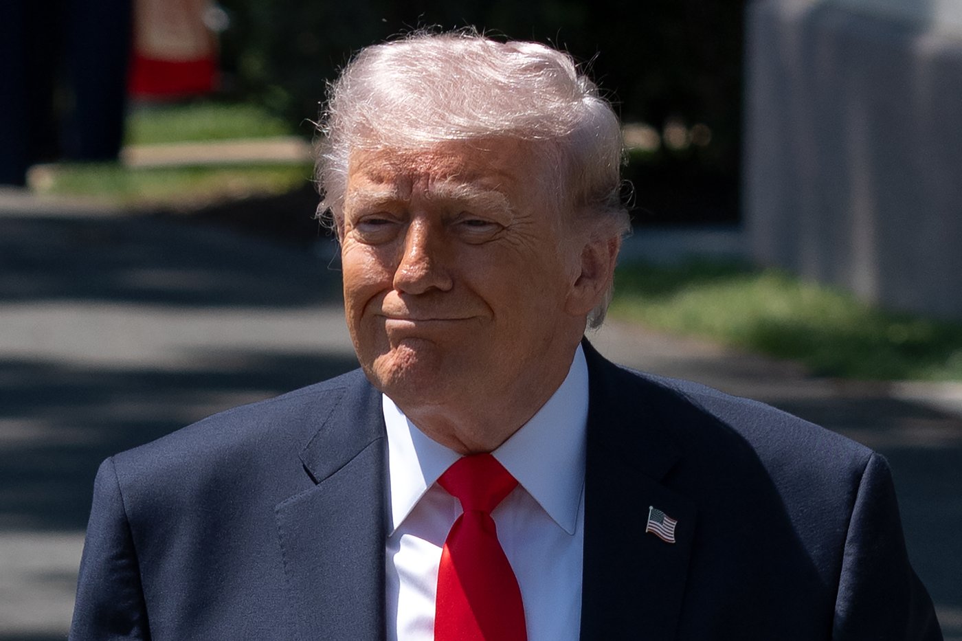 President Donald Trump walks to speak with reporters as he prepares to board Marine One on the South Lawn of the White House, Friday, May 1, 2026, in Washington. (AP Photo/Mark Schiefelbein)