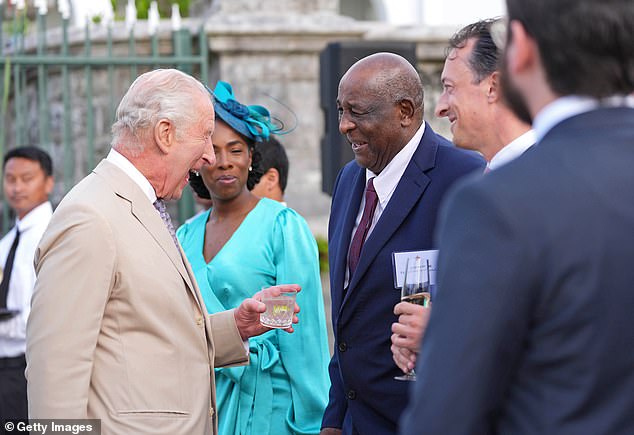 Charles met Clyde Best, the Bermudian former West Ham striker and one of the first black players in the English First Division, at the garden party