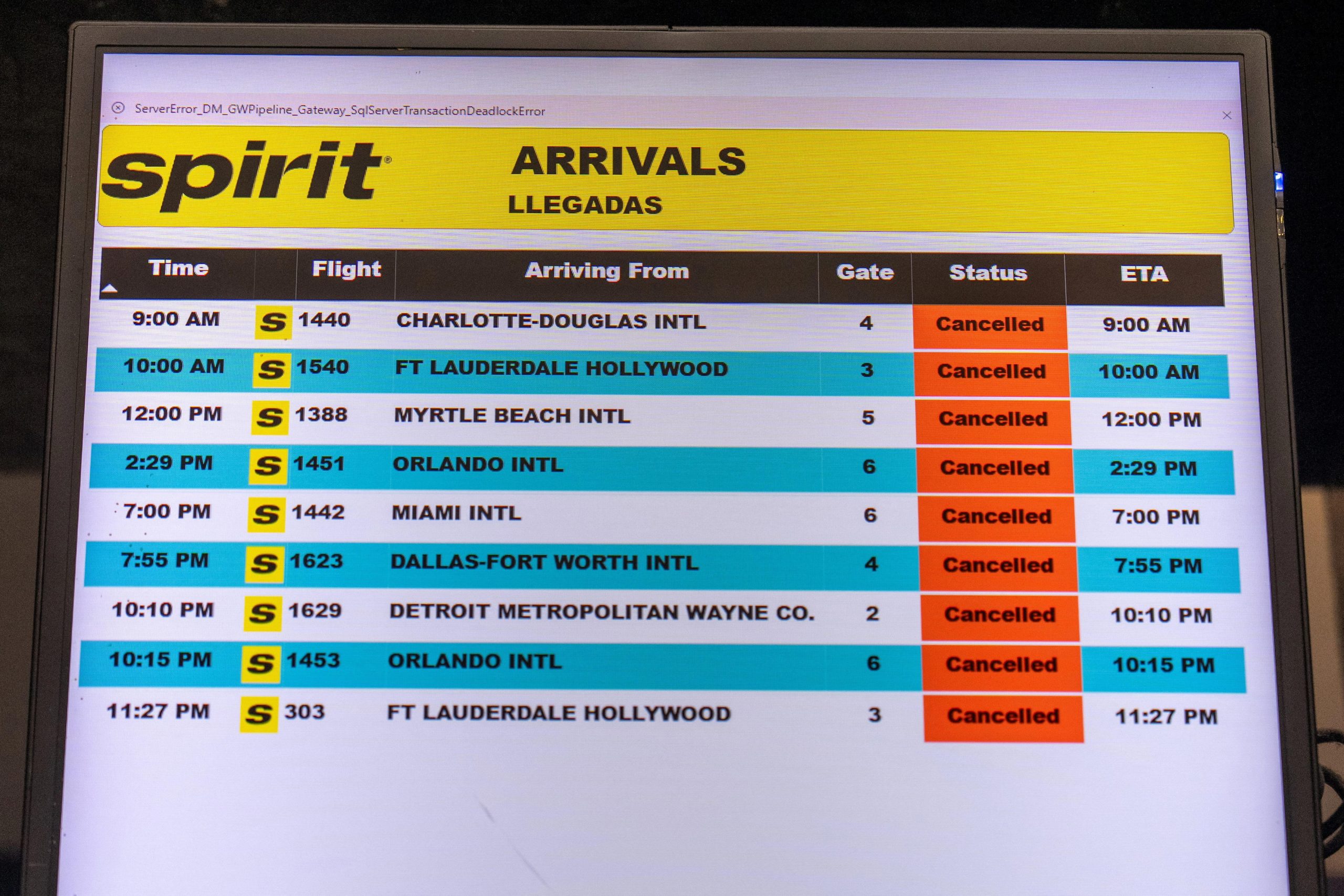 A departure board displays cancelled flights informing passengers of the airlines shutdown of Spirit Airlines at LaGuardia Airport in Queens, in New York City, U.S., May 2, 2026. REUTERS/David 'Dee' Delgado