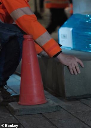 The video shows a close-up of red cones and lorry stabilisers