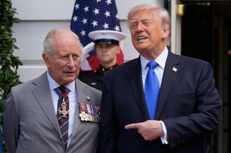 Donald Trump speaks as he greets Britain's King Charles III during a departure ceremony on the South Lawn of the White House.