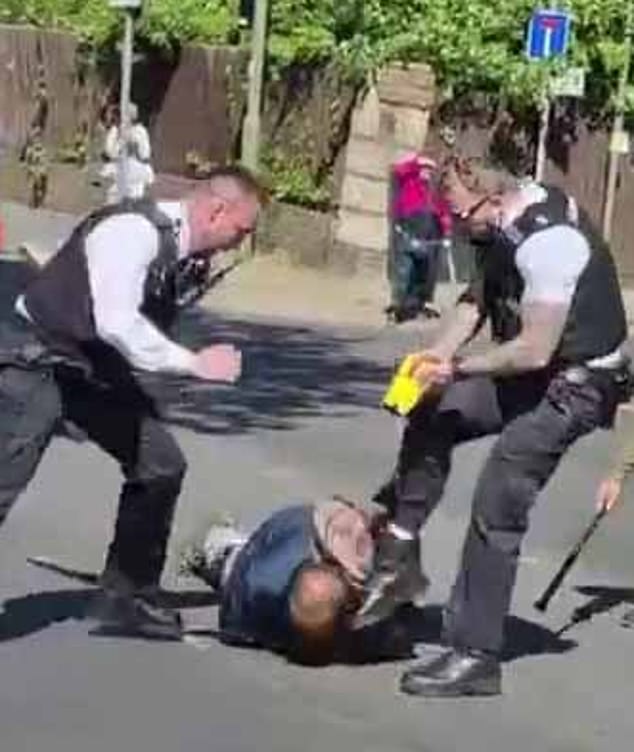 The footage showed two officers from the Met Police confront the alleged terrorist, Taser him and then kick him while shouting at him to 'drop the knife'