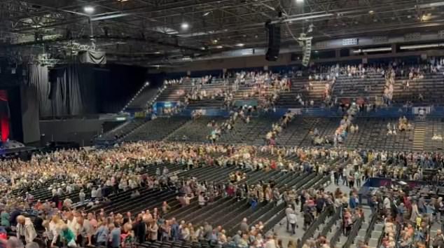 The crowd evacuating at Peter Kay's show Friday in Birmingham's Utilita Arena 