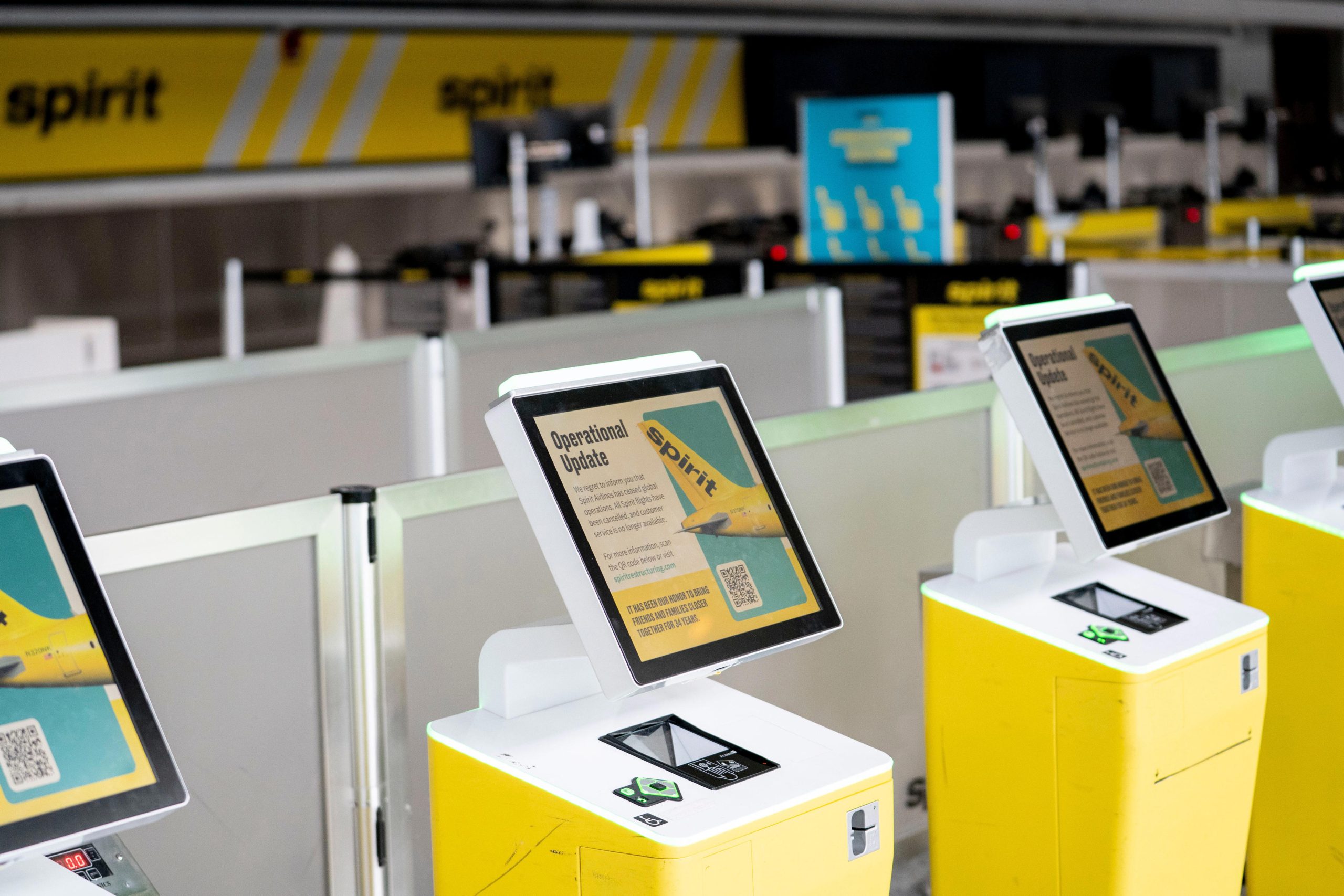 The Spirit Airlines ticket counter at Detroit Metro Airport is closed down after the airline shut down overnight on May 2, 2026, in Romulus, Michigan.