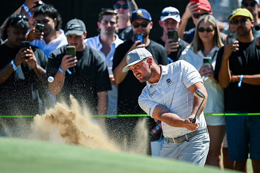 Bryson Dechambeau of Crushers hits out of a bunker on the 13th during day two of LIV Adelaide at The Grange Golf Club on February 13, 2026 in Adelaide, Australia. (Pic: Mark Brake/Getty Images)