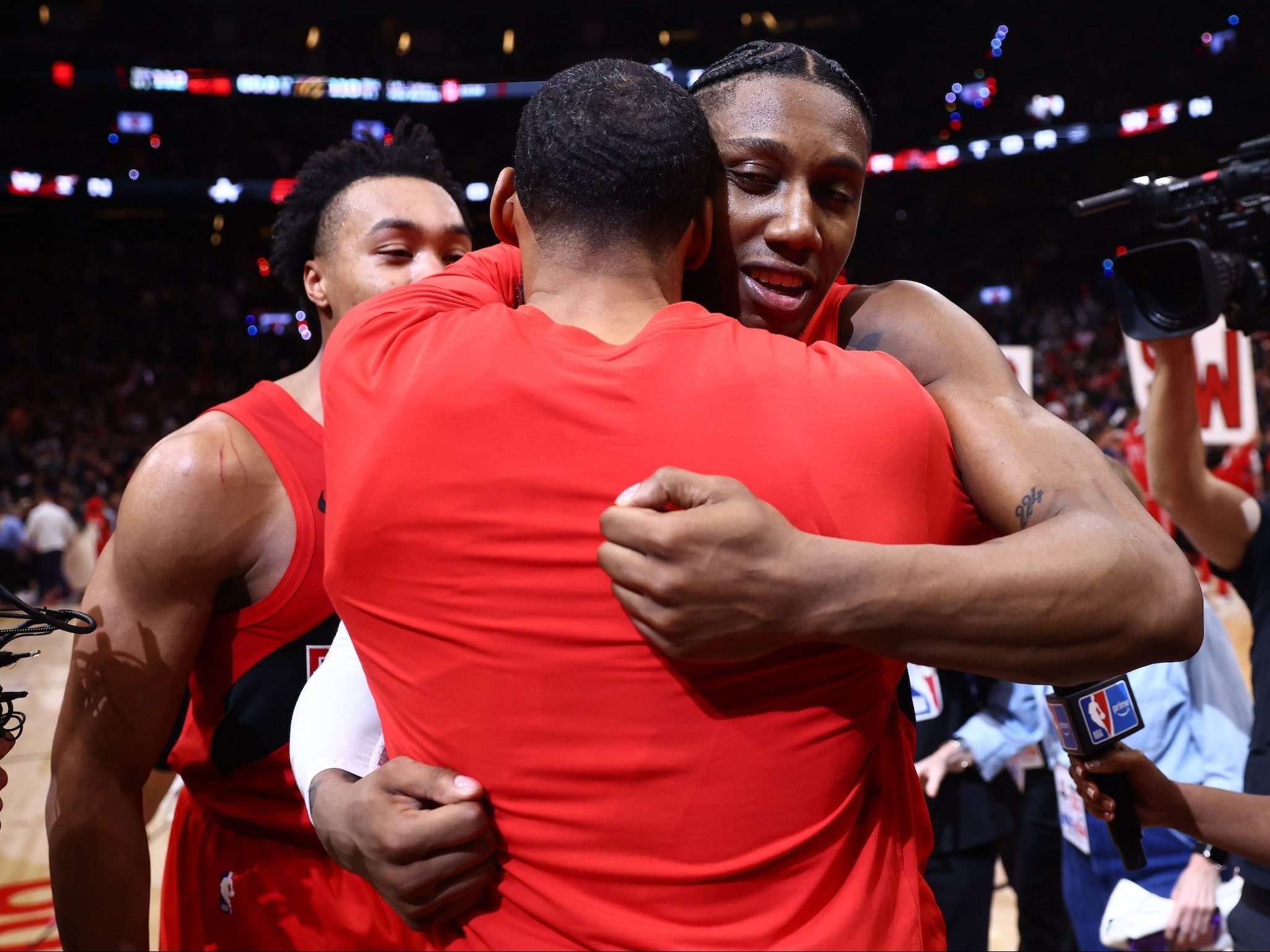 RJ Barrett #9 and Garrett Temple #17 of the Toronto Raptors celebrate after defeating the Cleveland Cavaliers 112-110 in Game Six of the First Round of the NBA Eastern Conference Playoffs at Scotiabank Arena on May 01, 2026 in Toronto.