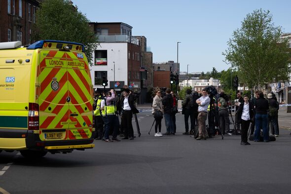 Police in Golders Green yesterday after a stabbing